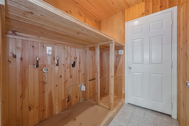 7230 Redding Rd, Houston, TX 77036 - mudroom featuring light tile patterned floors and wood ceiling