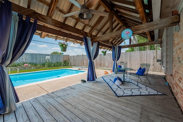 7230 Redding Rd, Houston, TX 77036 - view of swimming pool with a deck, a ceiling fan, and a fenced backyard