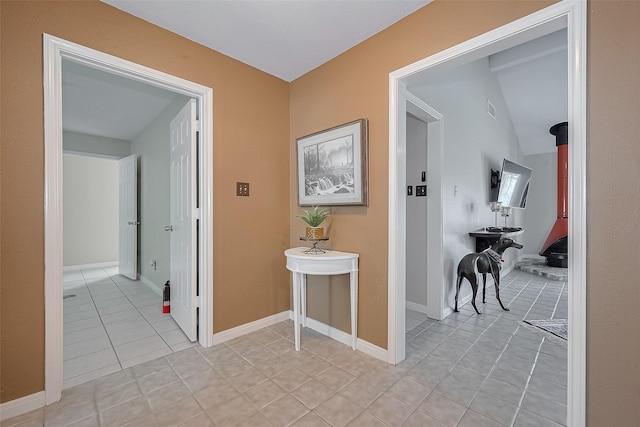 7230 Redding Rd, Houston, TX 77036 - corridor with light tile patterned flooring and baseboards