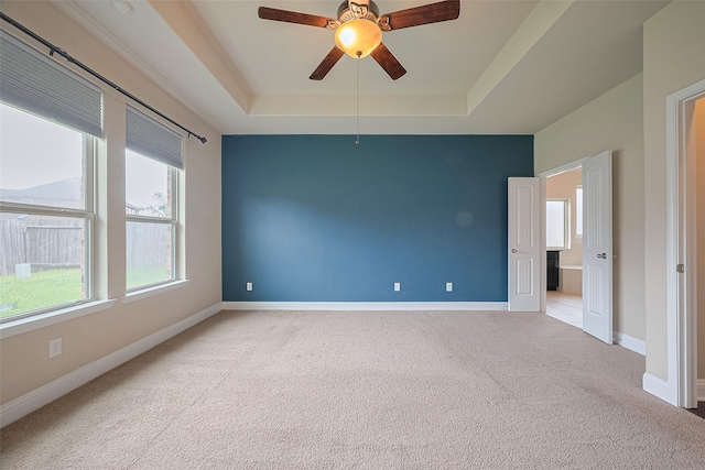310 Blossom Terrace Ln, Rosenberg, TX 77469 - carpeted spare room featuring a raised ceiling and ceiling fan