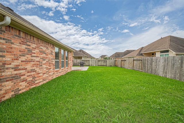 310 Blossom Terrace Ln, Rosenberg, TX 77469 - fenced backyard with a patio
