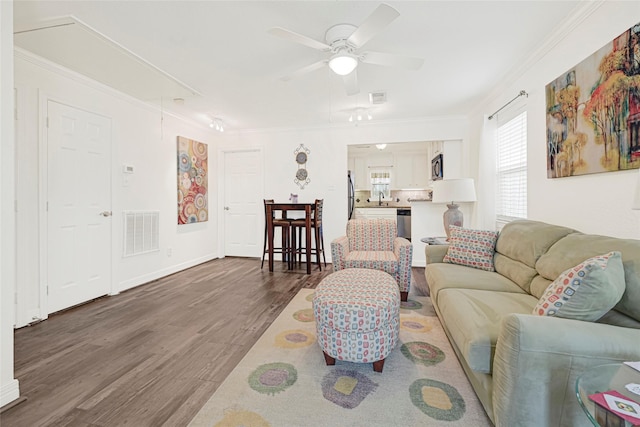4401 Marina St Unit B, Houston, TX 77007 - living room with attic access, wood finished floors, ceiling fan, and crown molding