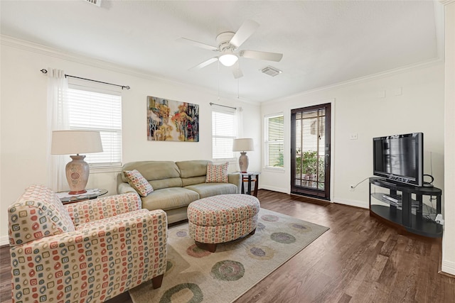 4401 Marina St Unit B, Houston, TX 77007 - living area featuring wood finished floors, healthy amount of natural light, crown molding, and ceiling fan