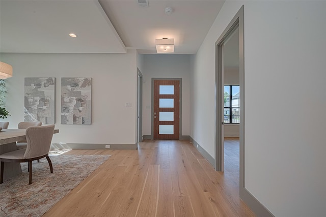 5200 Beech St, Bellaire, TX 77401 - foyer entrance featuring light wood-style floors and recessed lighting