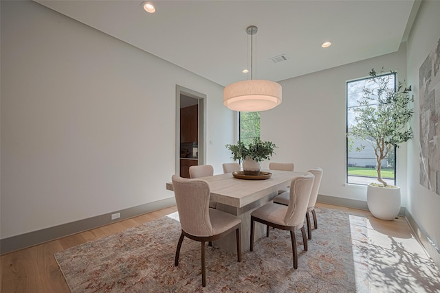 5200 Beech St, Bellaire, TX 77401 - dining room featuring light wood finished floors and recessed lighting