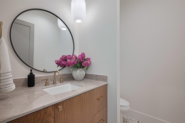 5200 Beech St, Bellaire, TX 77401 - bathroom with toilet and vanity