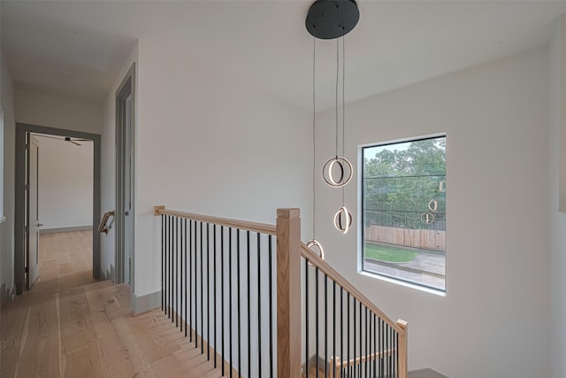 5200 Beech St, Bellaire, TX 77401 - hall with an upstairs landing and wood finished floors