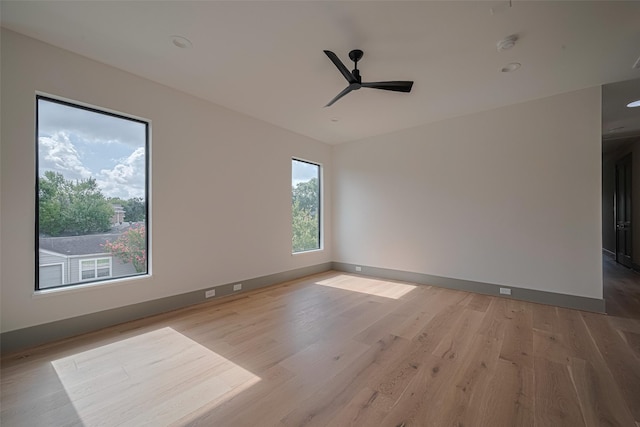 5200 Beech St, Bellaire, TX 77401 - spare room with a ceiling fan, light wood-type flooring, recessed lighting, and a smoke detector