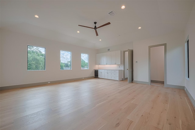 5200 Beech St, Bellaire, TX 77401 - unfurnished living room featuring light wood-type flooring, a ceiling fan, and recessed lighting