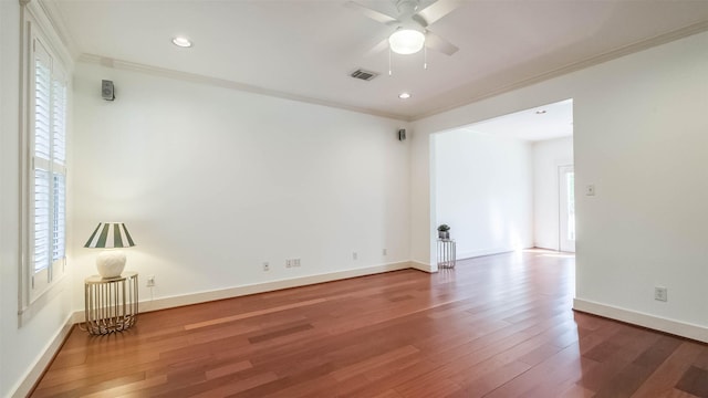 1045 W 16th St, Houston, TX 77008 - spare room with crown molding, wood finished floors, a ceiling fan, and recessed lighting