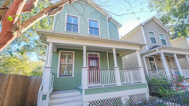 1045 W 16th St, Houston, TX 77008 - view of front of home featuring a porch