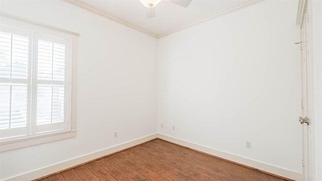 1045 W 16th St, Houston, TX 77008 - unfurnished room featuring healthy amount of natural light, ornamental molding, wood finished floors, and a ceiling fan