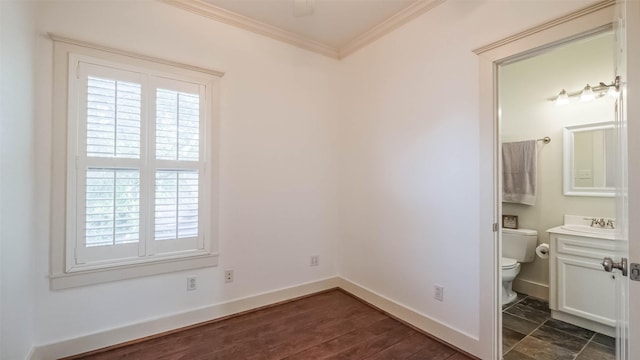 1045 W 16th St, Houston, TX 77008 - bathroom featuring ornamental molding and vanity