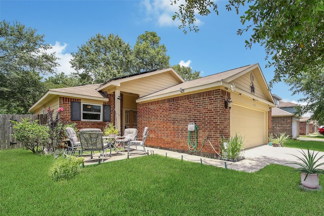 9731 Gulfstream Dr, Conroe, TX 77303 - single story home with brick siding, an attached garage, and driveway