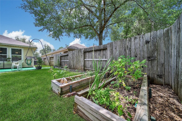 9731 Gulfstream Dr, Conroe, TX 77303 - fenced backyard with a vegetable garden