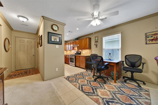 9731 Gulfstream Dr, Conroe, TX 77303 - office area with crown molding, light tile patterned floors, ceiling fan, and a textured ceiling