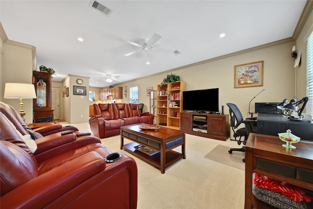 9731 Gulfstream Dr, Conroe, TX 77303 - living area featuring light colored carpet, crown molding, recessed lighting, and ceiling fan