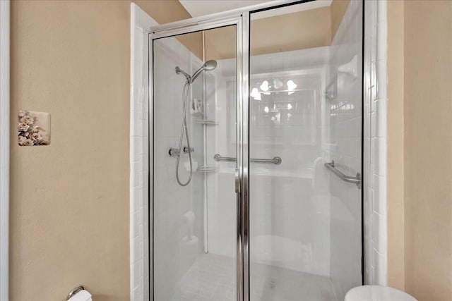 1403 Newport Blvd, League City, TX 77573 - full bath featuring a shower stall and a textured wall
