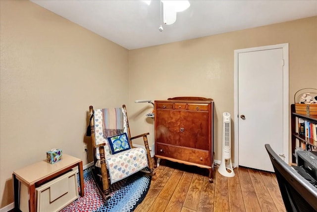 1403 Newport Blvd, League City, TX 77573 - living area with hardwood / wood-style flooring and baseboards