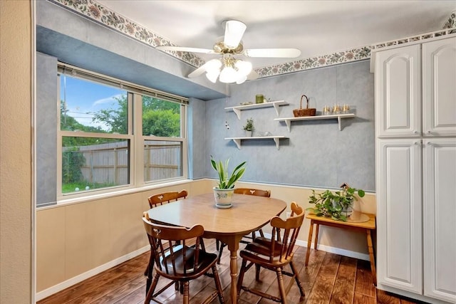 1403 Newport Blvd, League City, TX 77573 - dining space featuring dark wood finished floors and ceiling fan