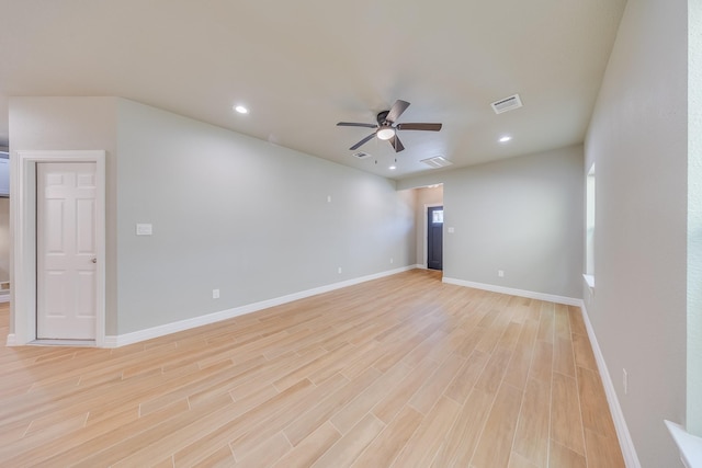 2142 De Soto St, Houston, TX 77091 - spare room featuring light wood-type flooring, ceiling fan, and recessed lighting