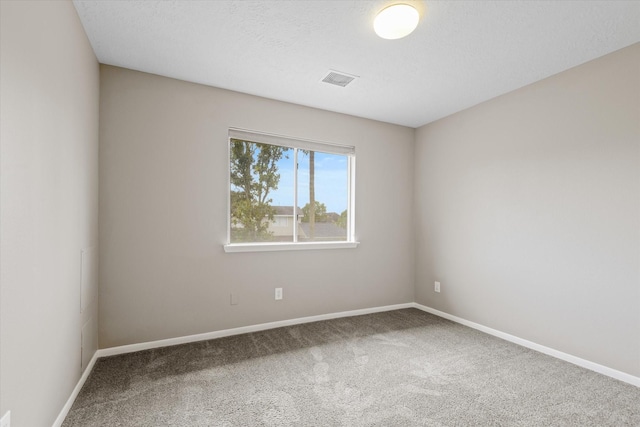 2625 Seashore Dr, Seabrook, TX 77586 - carpeted spare room with baseboards