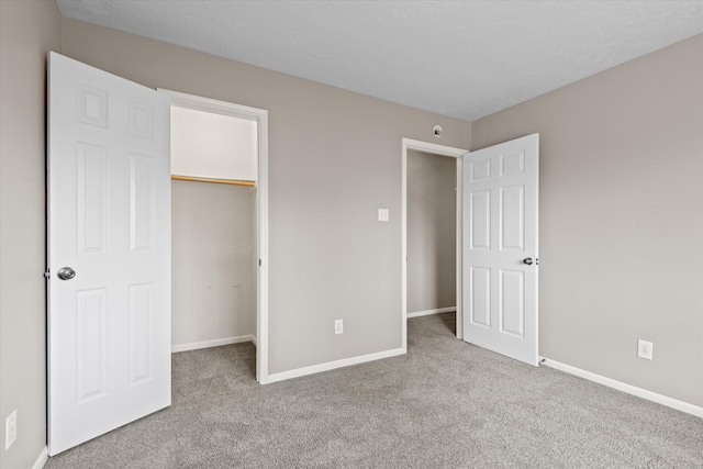 2625 Seashore Dr, Seabrook, TX 77586 - unfurnished bedroom featuring carpet and a spacious closet