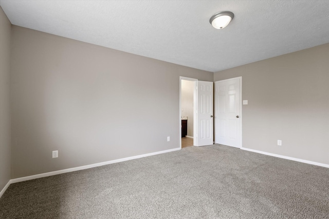 2625 Seashore Dr, Seabrook, TX 77586 - carpeted empty room with baseboards