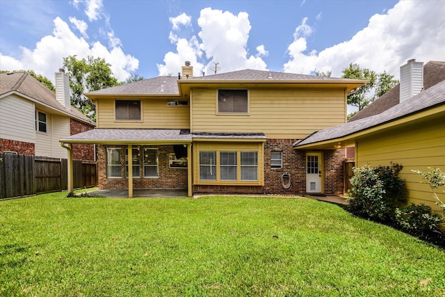 2625 Seashore Dr, Seabrook, TX 77586 - back of house featuring a patio area, a fenced backyard, brick siding, and a shingled roof