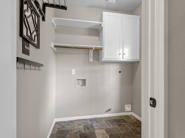 2625 Seashore Dr, Seabrook, TX 77586 - laundry area featuring hookup for a washing machine, hookup for a gas dryer, hookup for an electric dryer, cabinet space, and stone tile floors
