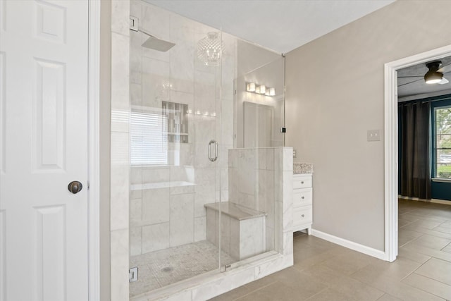2625 Seashore Dr, Seabrook, TX 77586 - full bathroom with a shower stall, vanity, and tile patterned floors