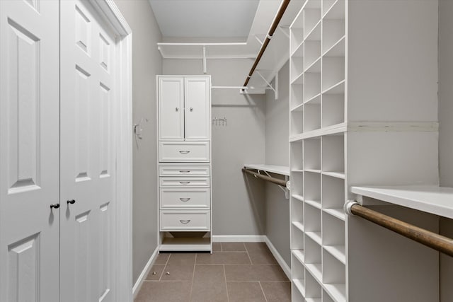 2625 Seashore Dr, Seabrook, TX 77586 - walk in closet with tile patterned floors