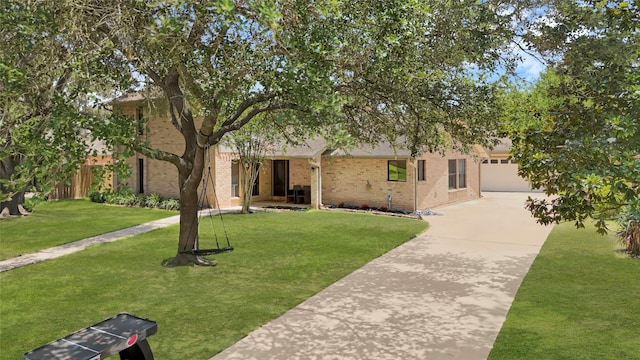503 Ellingham Dr, Katy, TX 77450 - view of front of home with concrete driveway, brick siding, and a garage
