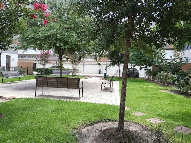 2401 Crawford St Unit A109, Houston, TX 77004 - view of property's community with a patio area