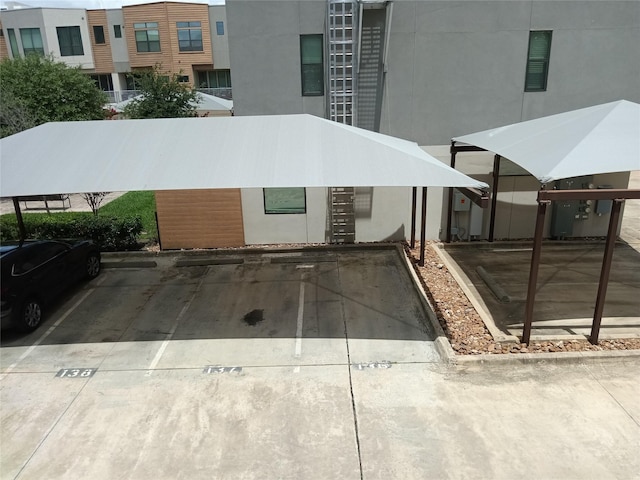 2401 Crawford St Unit A109, Houston, TX 77004 - view of building exterior featuring uncovered parking