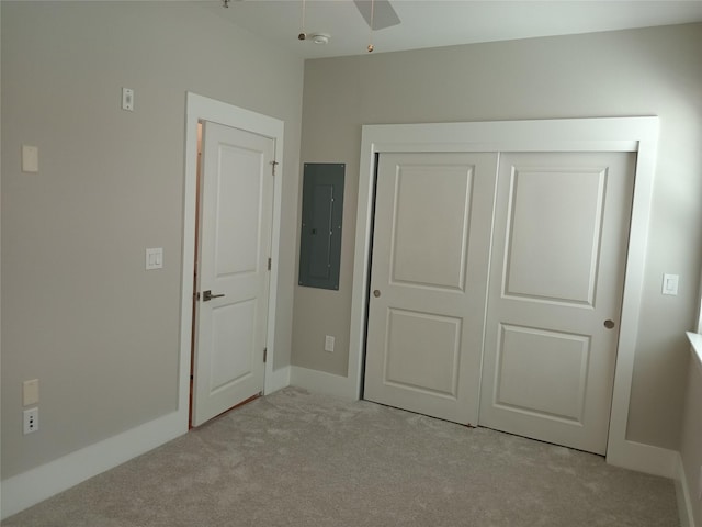 2401 Crawford St Unit A109, Houston, TX 77004 - unfurnished bedroom featuring electric panel, carpet, a closet, and a ceiling fan