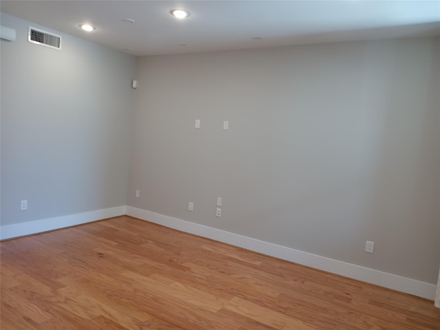 2401 Crawford St Unit A109, Houston, TX 77004 - unfurnished room with light wood-style flooring and recessed lighting
