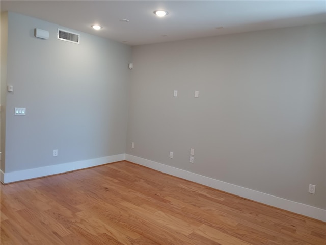 2401 Crawford St Unit A109, Houston, TX 77004 - empty room with light wood-style floors and recessed lighting