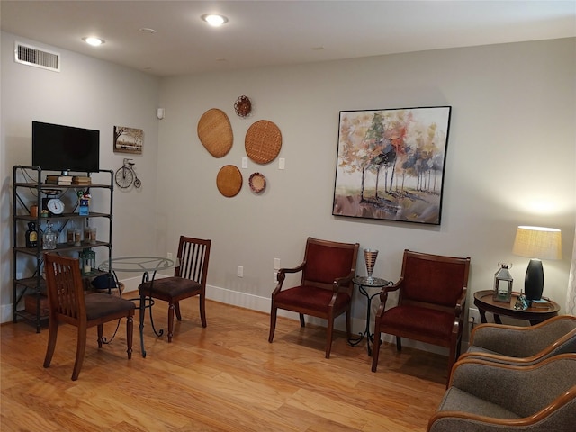 2401 Crawford St Unit A109, Houston, TX 77004 - living area featuring light wood finished floors and recessed lighting