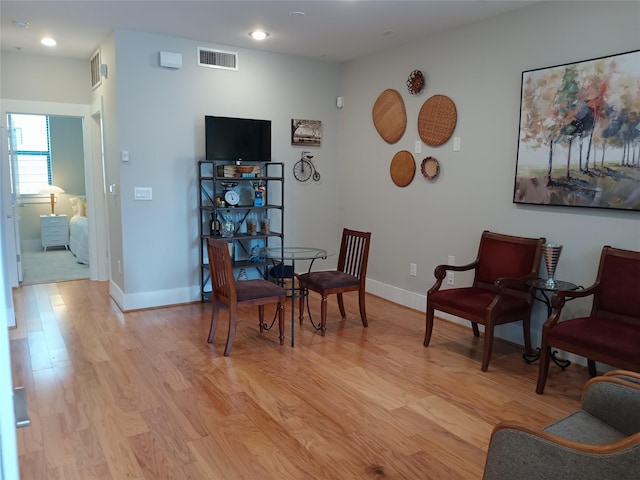 2401 Crawford St Unit A109, Houston, TX 77004 - living area featuring light wood-style floors and recessed lighting