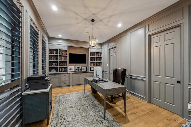 5001 Wedgewood Dr, Bellaire, TX 77401 - office featuring ornamental molding, light wood-style flooring, a decorative wall, a chandelier, and recessed lighting