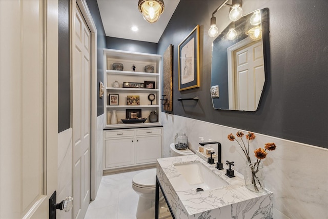 5001 Wedgewood Dr, Bellaire, TX 77401 - bathroom featuring vanity and toilet