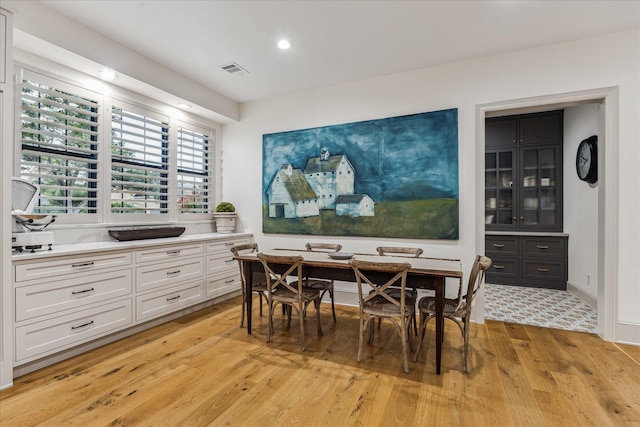 5001 Wedgewood Dr, Bellaire, TX 77401 - dining space featuring light wood-style floors and recessed lighting