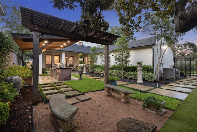 5001 Wedgewood Dr, Bellaire, TX 77401 - yard at dusk featuring a pergola and a patio area