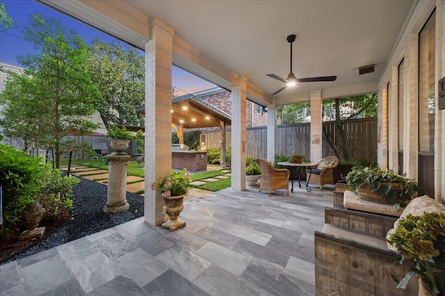 5001 Wedgewood Dr, Bellaire, TX 77401 - fenced backyard featuring a patio area and ceiling fan