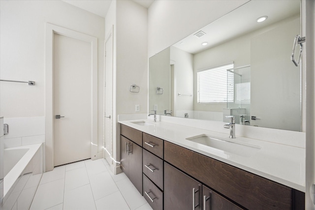 3208 N Macgregor Way Unit C, Houston, TX 77004 - full bath with a garden tub, double vanity, a walk in shower, and tile patterned floors
