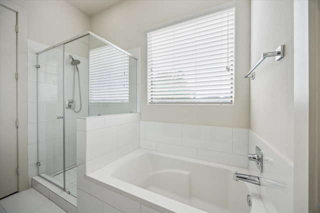 3208 N Macgregor Way Unit C, Houston, TX 77004 - full bathroom featuring a bath and a shower stall