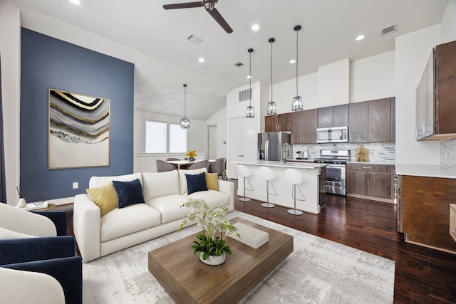 3208 N Macgregor Way Unit C, Houston, TX 77004 - living area with ceiling fan, dark wood finished floors, vaulted ceiling, and recessed lighting