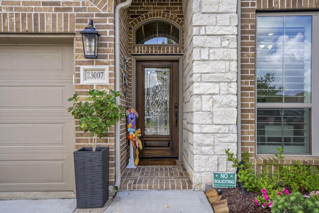 23007 Birchwood Valley Ln, Katy, TX 77493 - property entrance with stone siding and brick siding