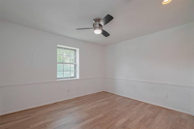 5711 Arenas Timbers Dr, Humble, TX 77346 - empty room with light wood-style flooring and a ceiling fan